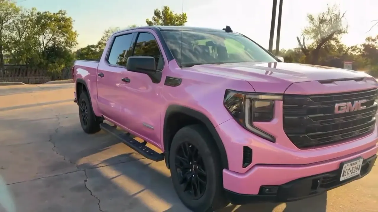 Pink GMC Sierra wrapped by Phantom